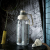 60oz Large Capacity Plastic Water Bottle with Straw and Handle Suitable for Gym Supports Custom logo